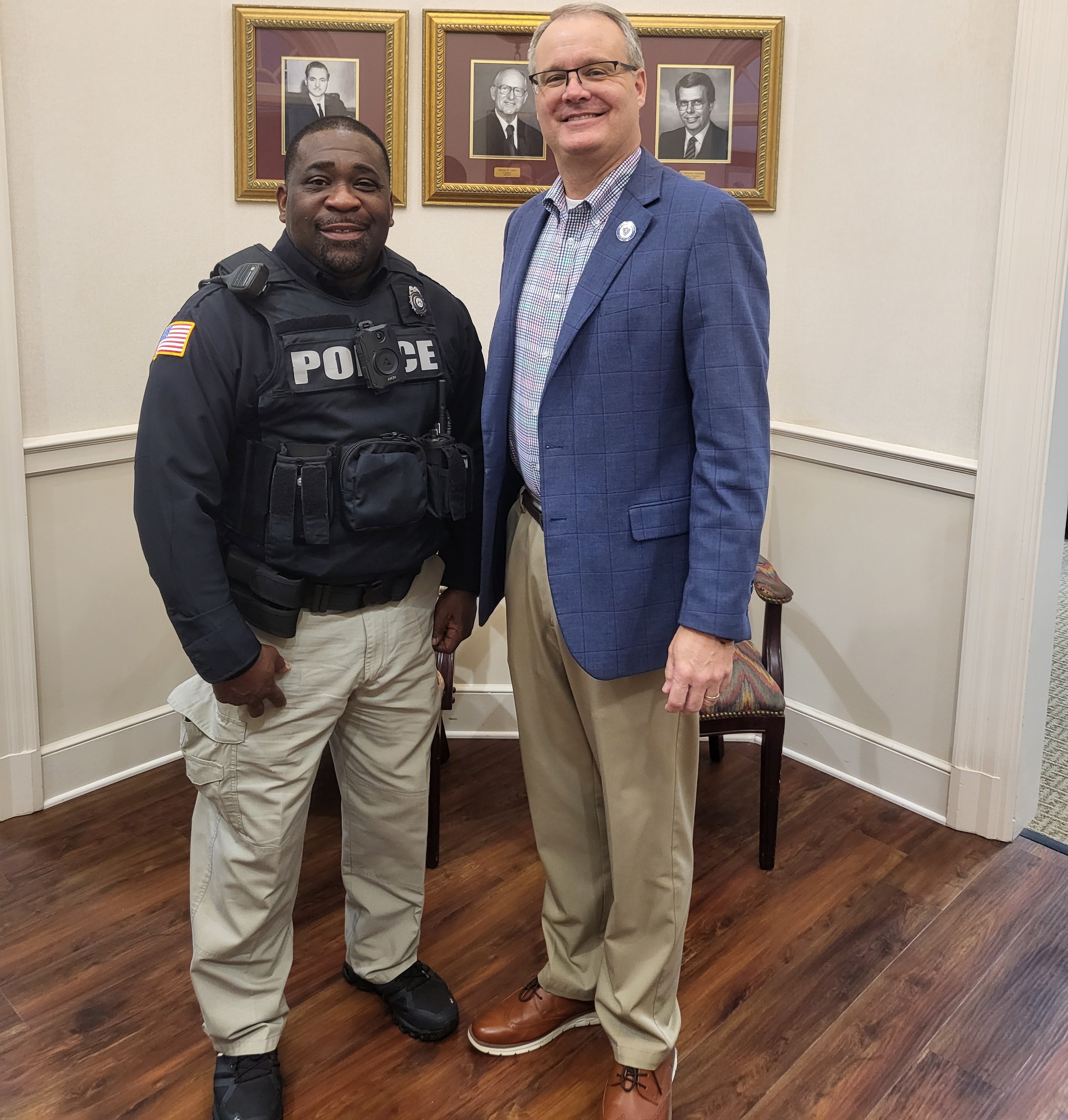 Draygo Evans with Dr. Greg Tanner in an office space